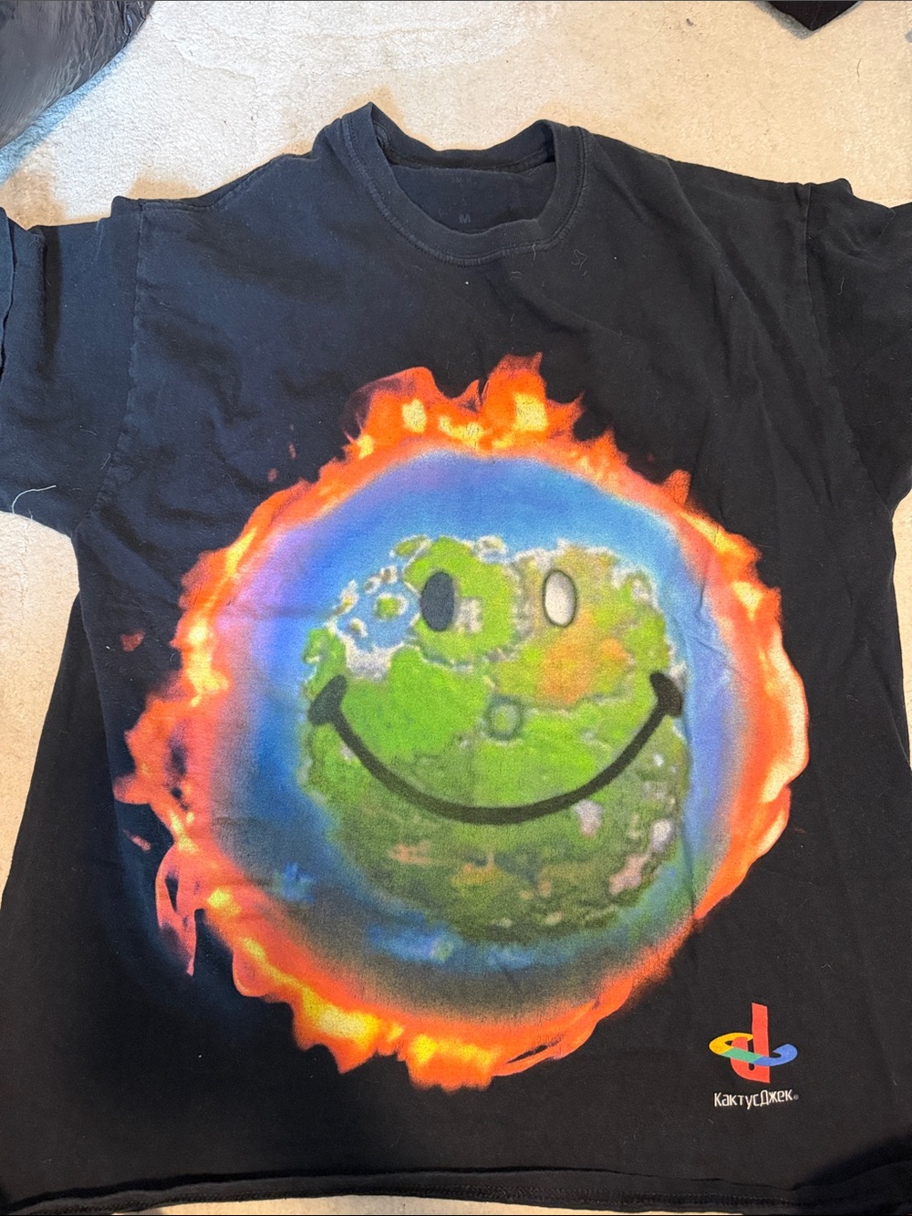 Supreme Black Tee with Flaming Smiley Earth Graphic